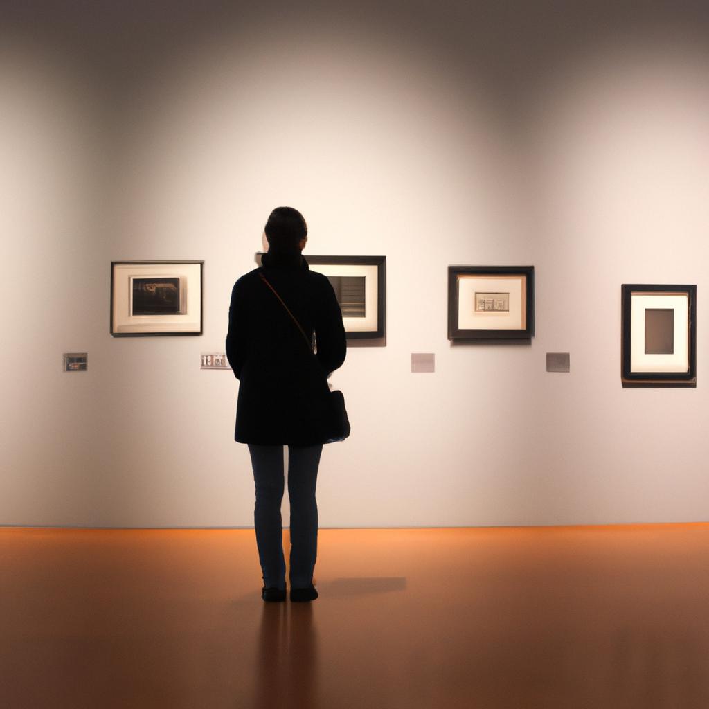 Person exploring art museum exhibits